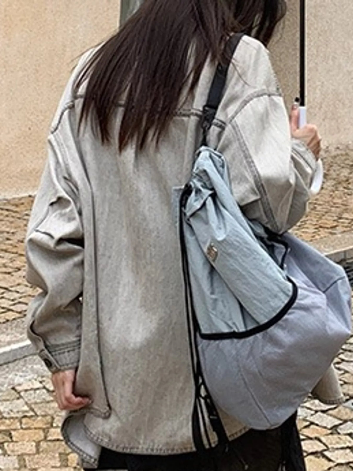 Gray button-down front denim shacket, back view