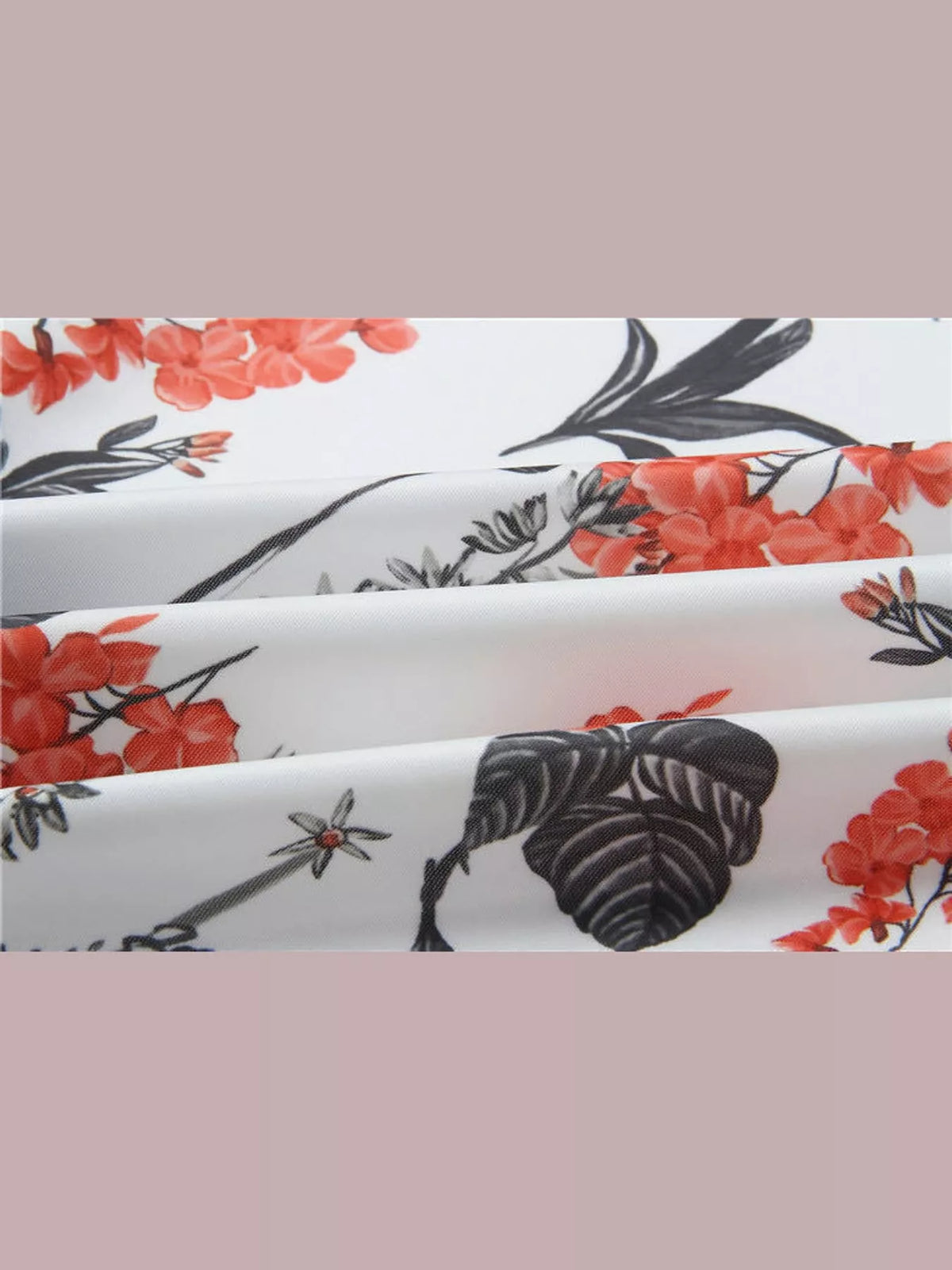White and red floral printed zip-up bomber jacket — design and construction details