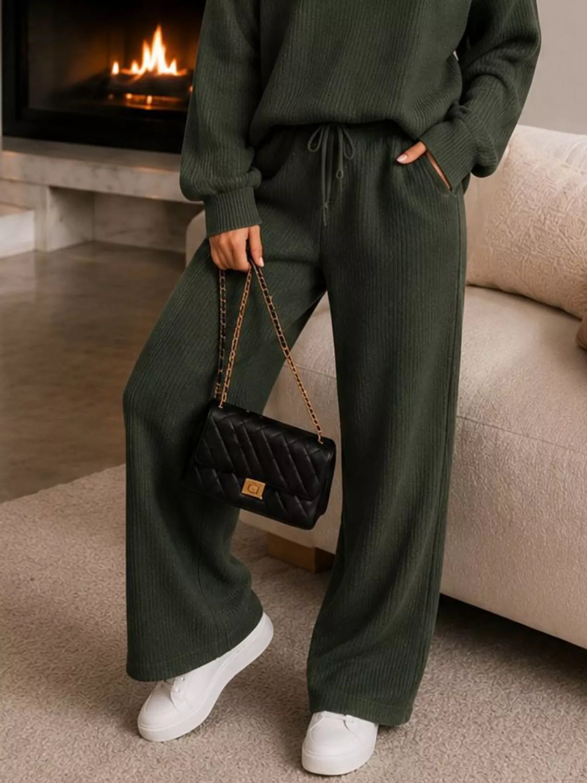 Green quarter-zip knit top and pants set, pants detail