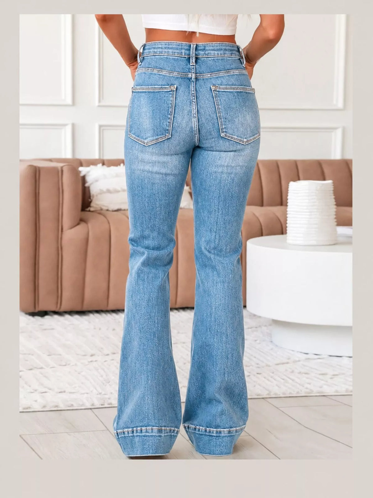 Light Blue high-rise flare leg jeans, back view