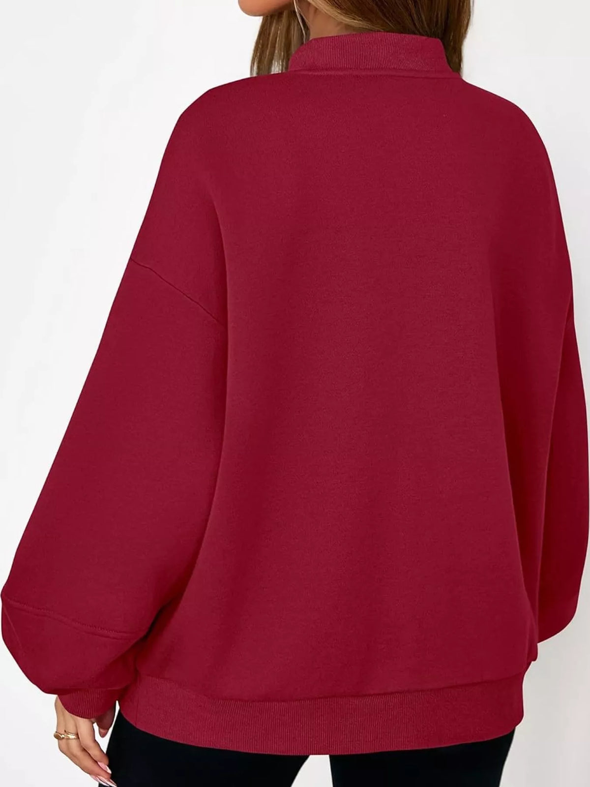 Red oversized zip-up jacket — back view