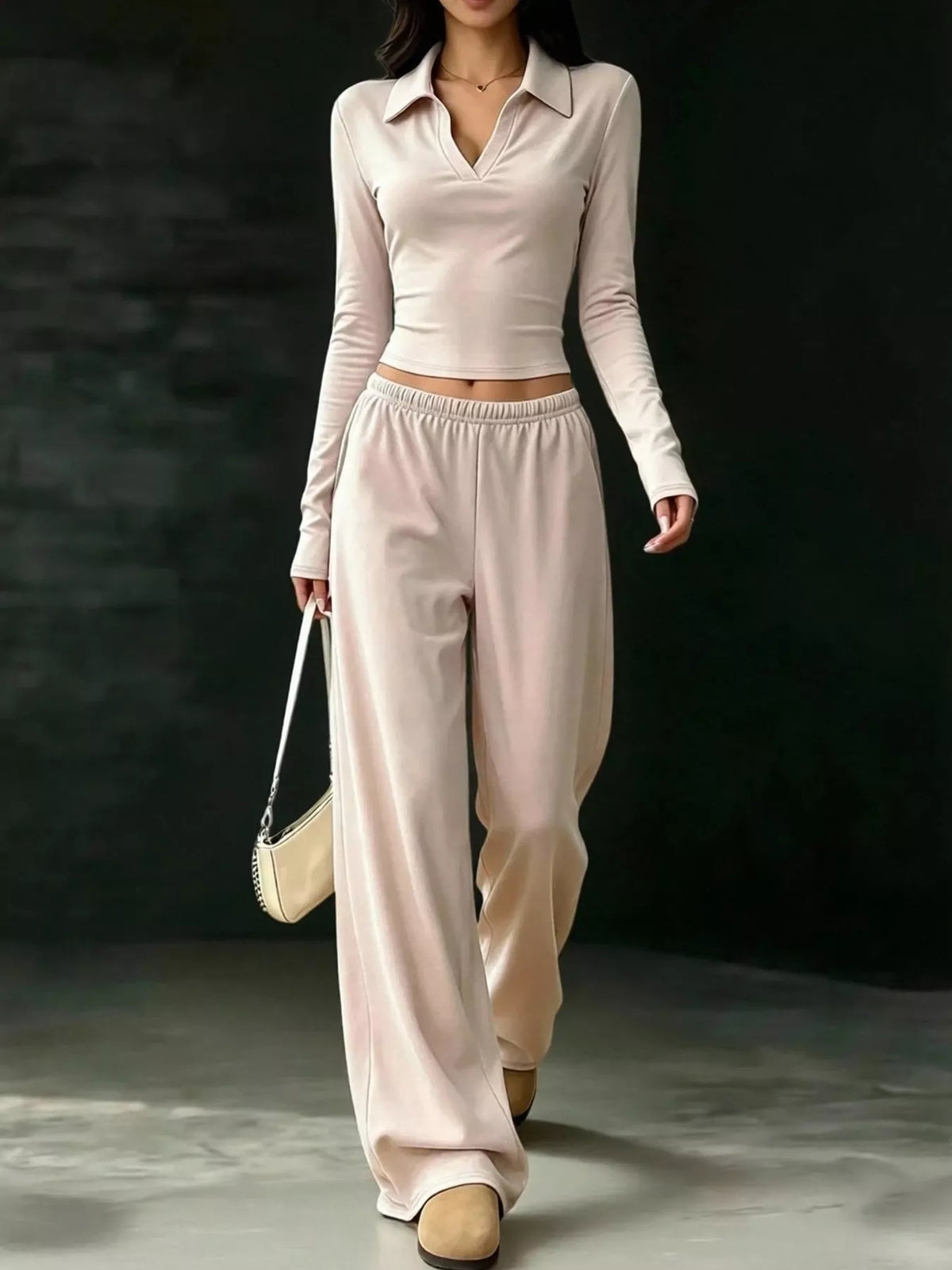 Beige collared crop top and wide-leg pants set, front walking view