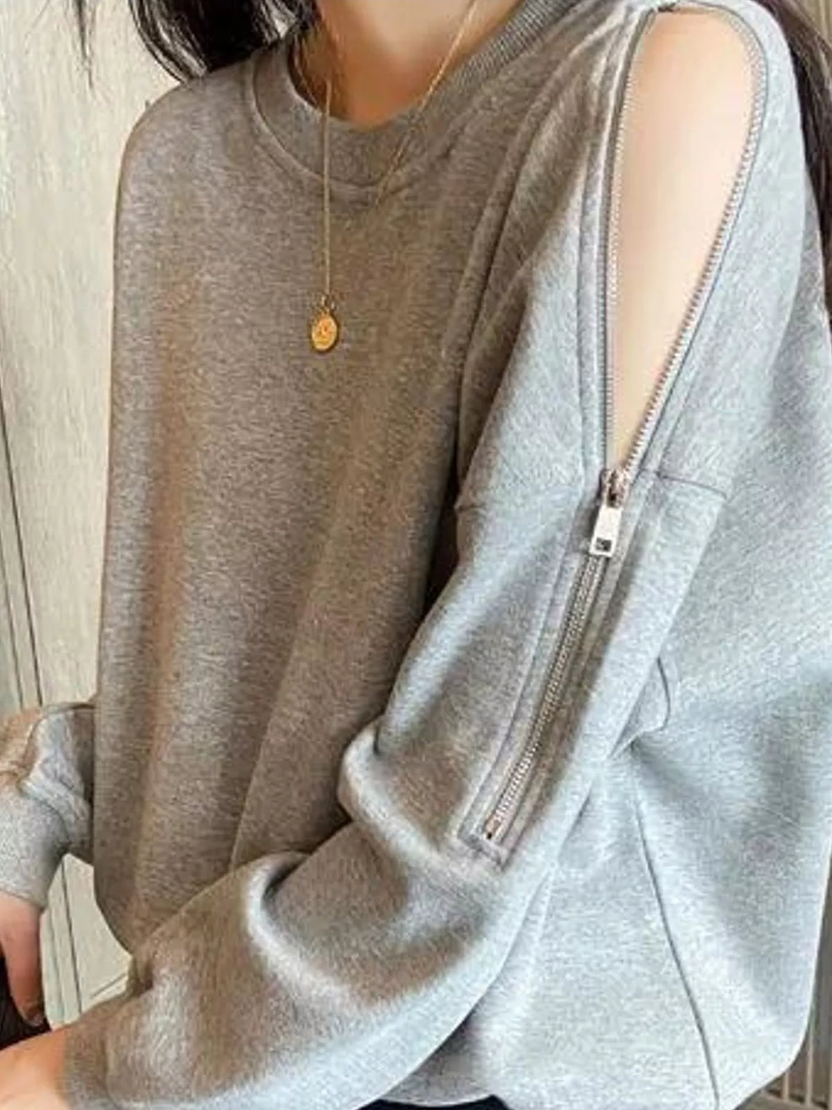 Women's Cold-Shoulder Zipper Detail Sweatshirt in gray — shoulder detail view