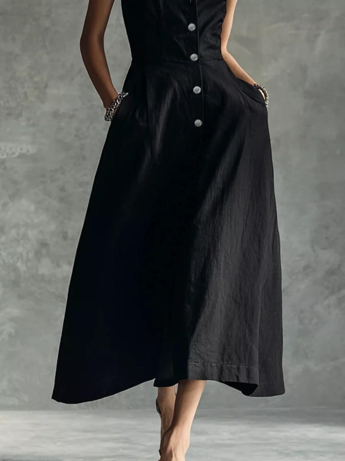 Black button-down midi shirt dress, skirt shape and side pockets