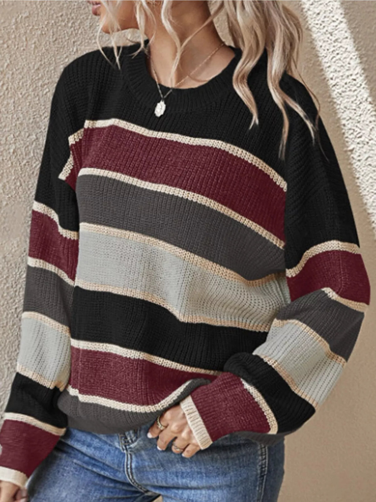 Color Block Striped Crew Neck Sweater in black with multicolor stripes, front view