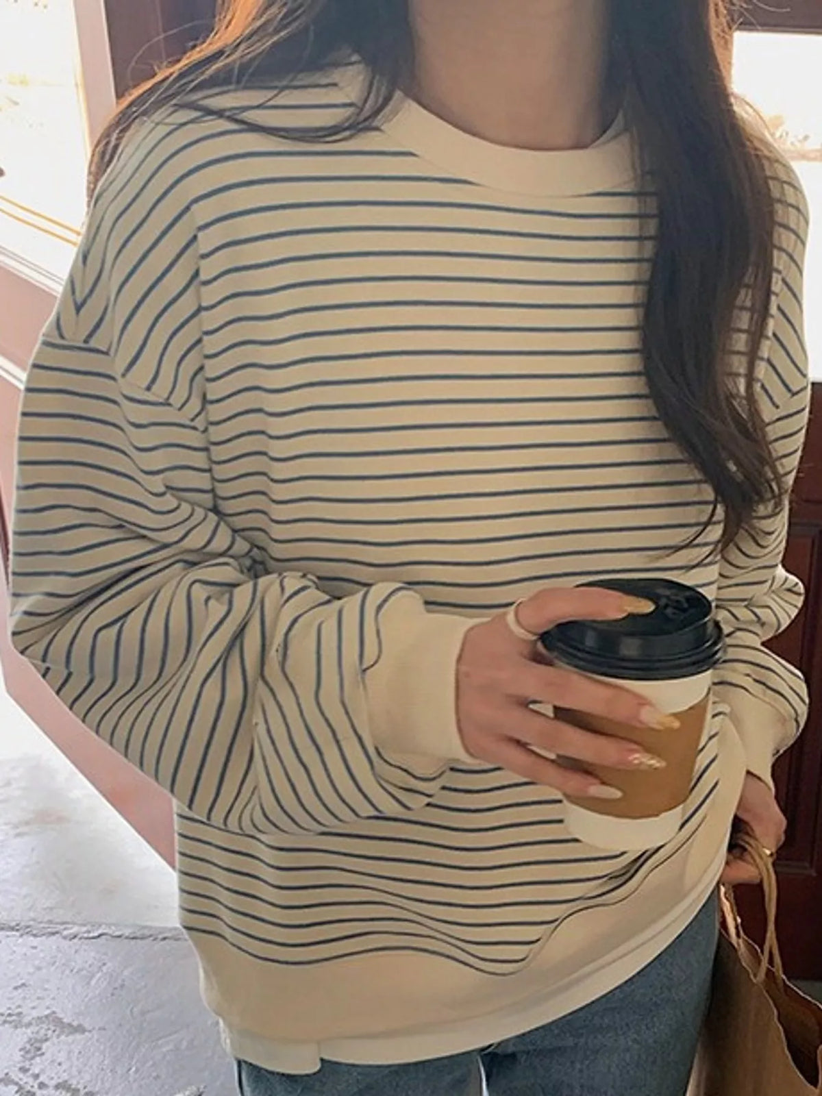 Cream and blue striped long sleeve crewneck t shirt, front view