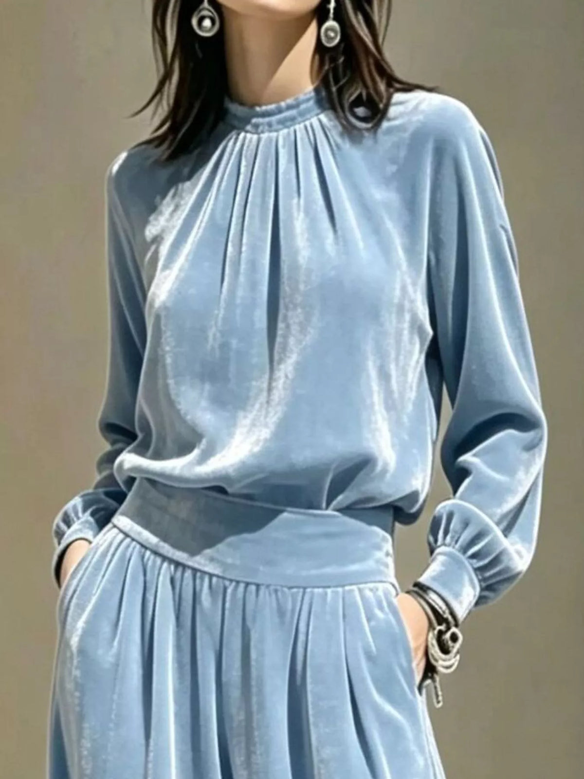 Blue velvet mock-neck top and pants set, neckline and waist detail