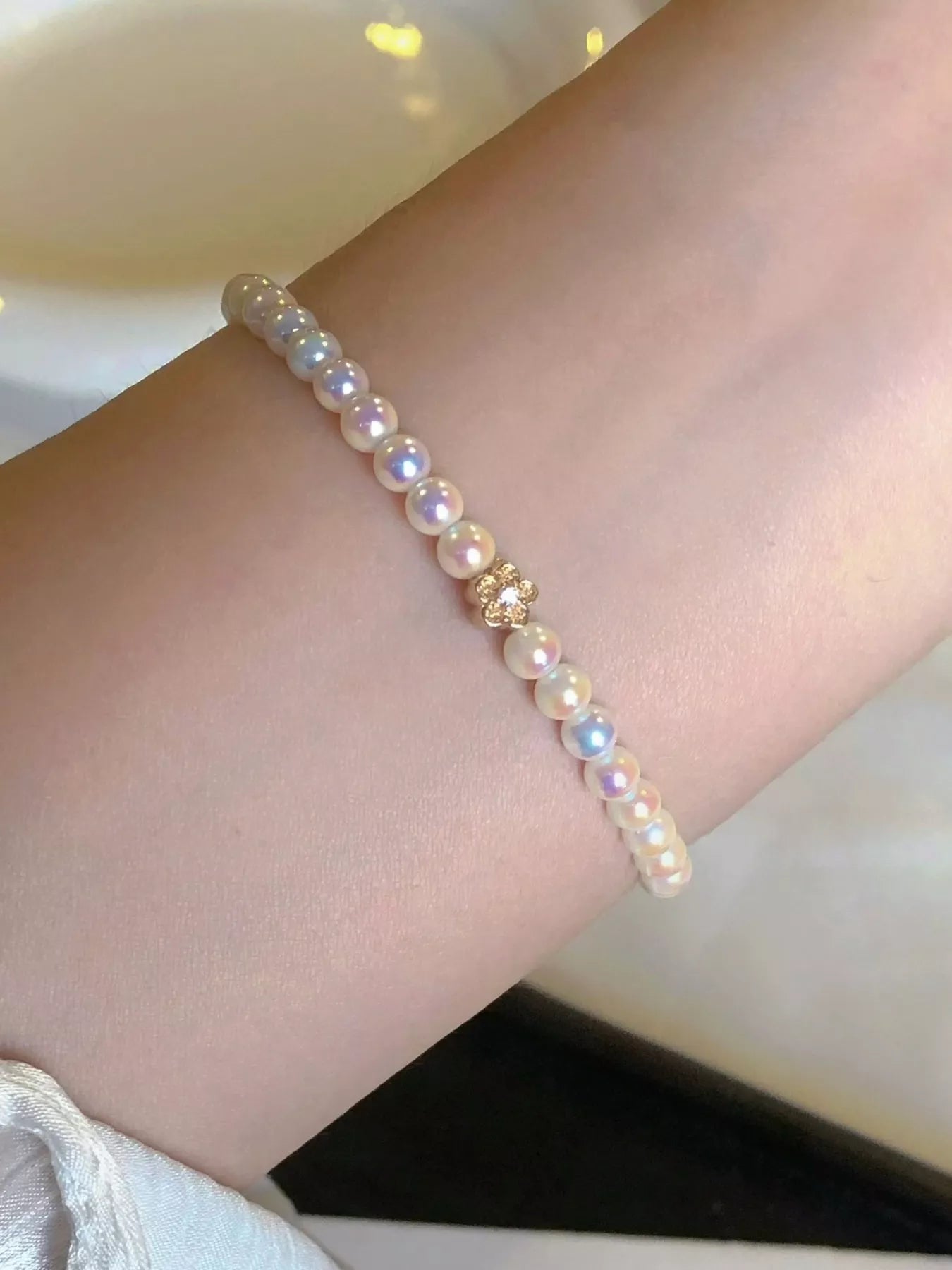 Trendsi Pearl Bracelet with Floral Accent -