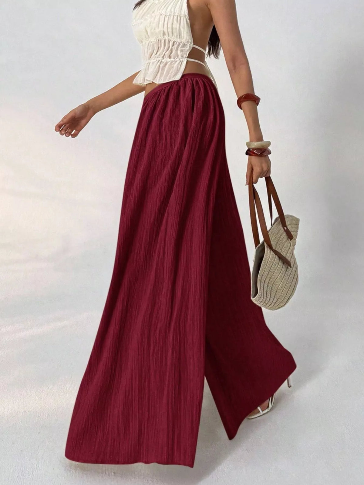 High-Waisted Pleated Wide-Leg Trousers, side view