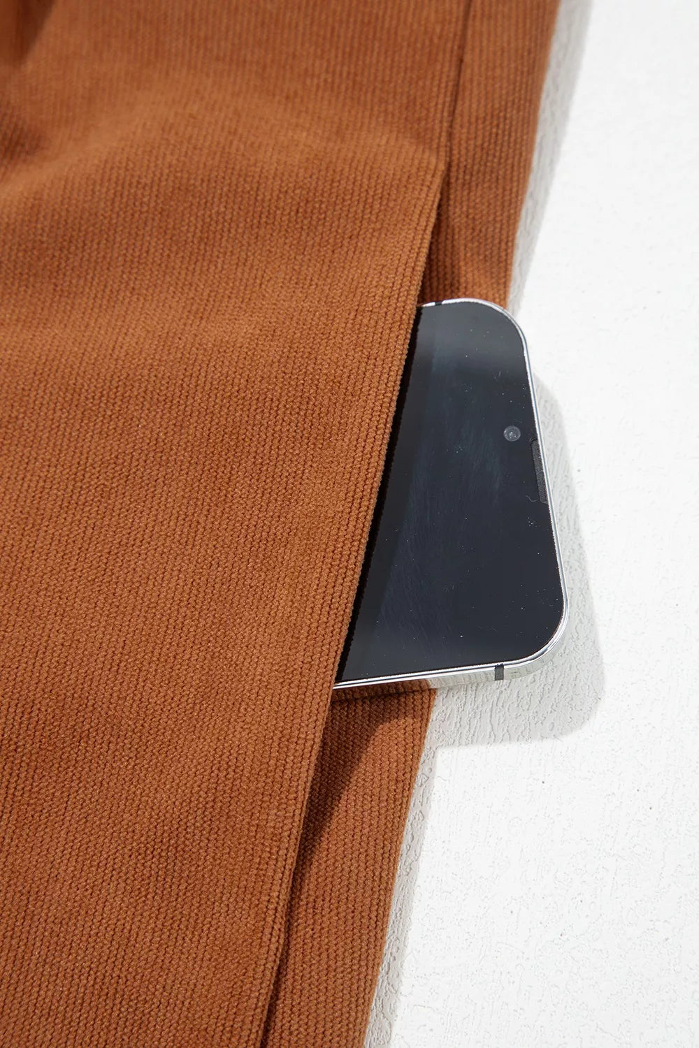 Rust brown corduroy romper, pocket detail