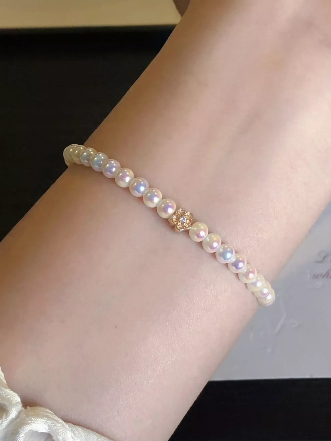 Trendsi Pearl Bracelet with Floral Accent -