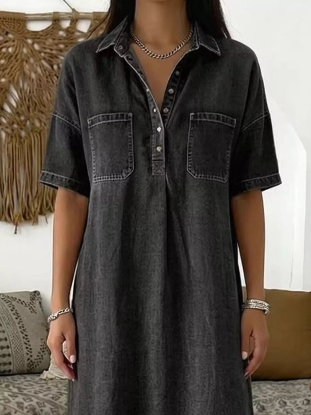 Black short sleeve dress with chest pockets — design and construction details