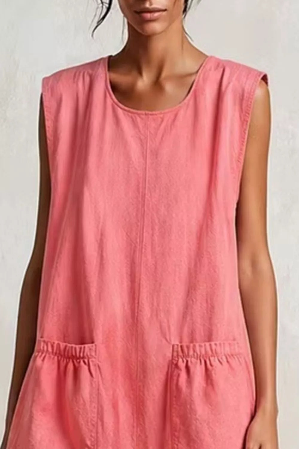 Pink and red ruffled-hem sleeveless dress, neckline detail