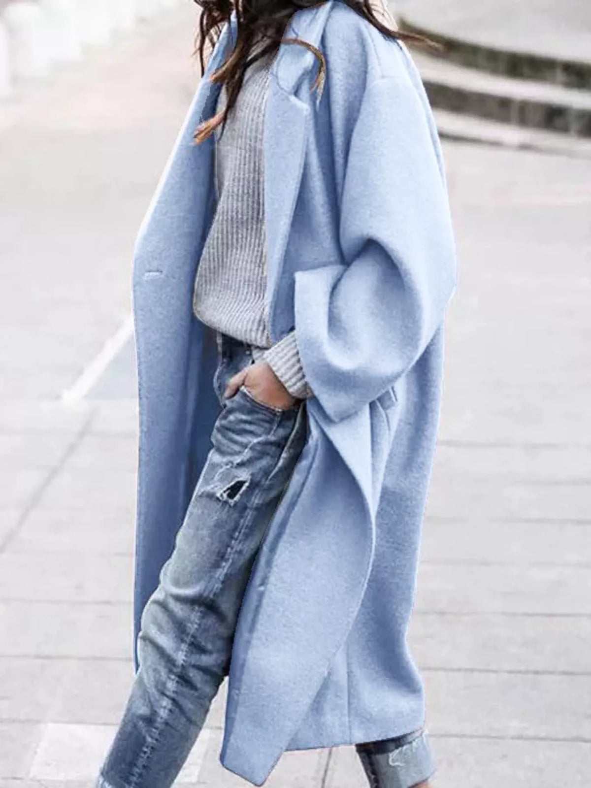 Light blue lapel collar one button coat, side view
