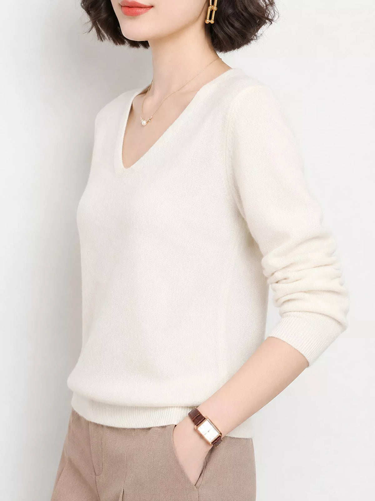 White v-neck long sleeve knit top