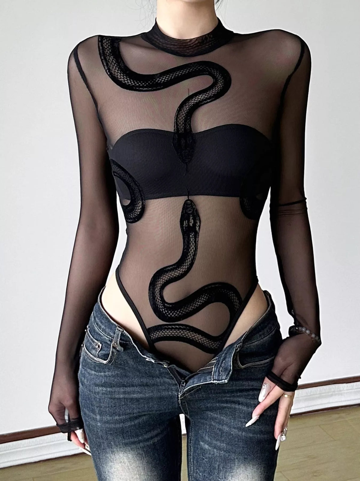 Black sheer mesh snake-motif bodysuit