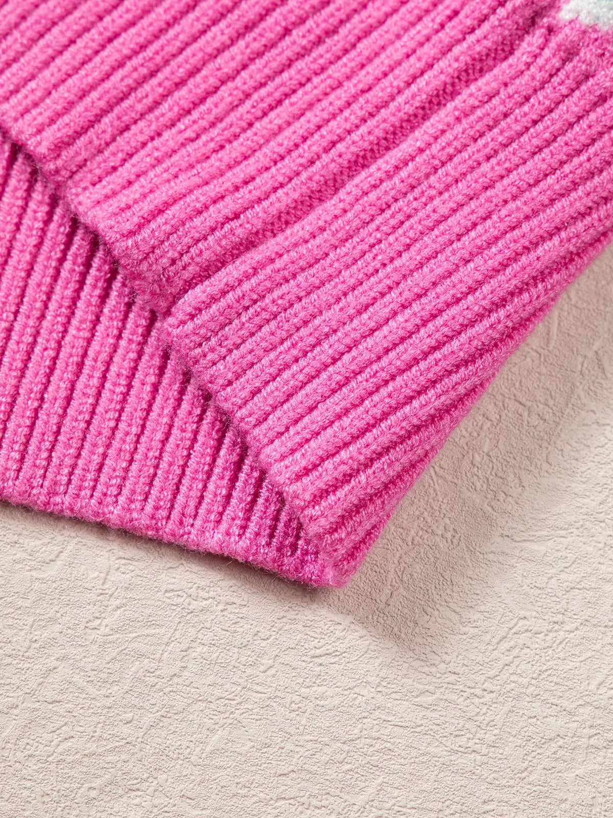 Pink Christmas graphic sweater, ribbed hem detail