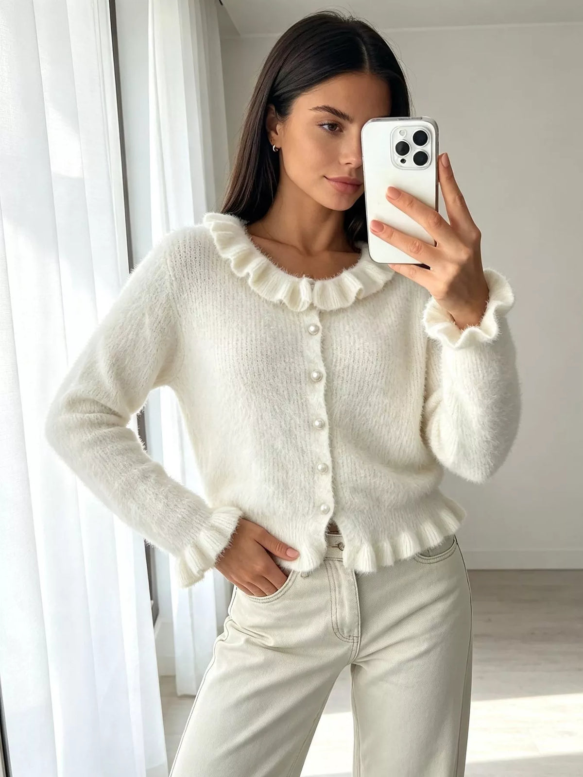 Ivory fuzzy ruffle-trim button-front cardigan, mirror front view.