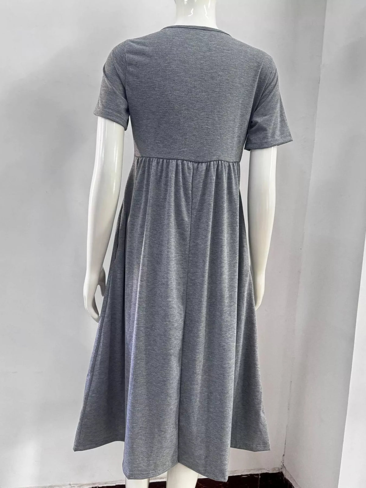 Gray crisscross short sleeve midi dress, back view