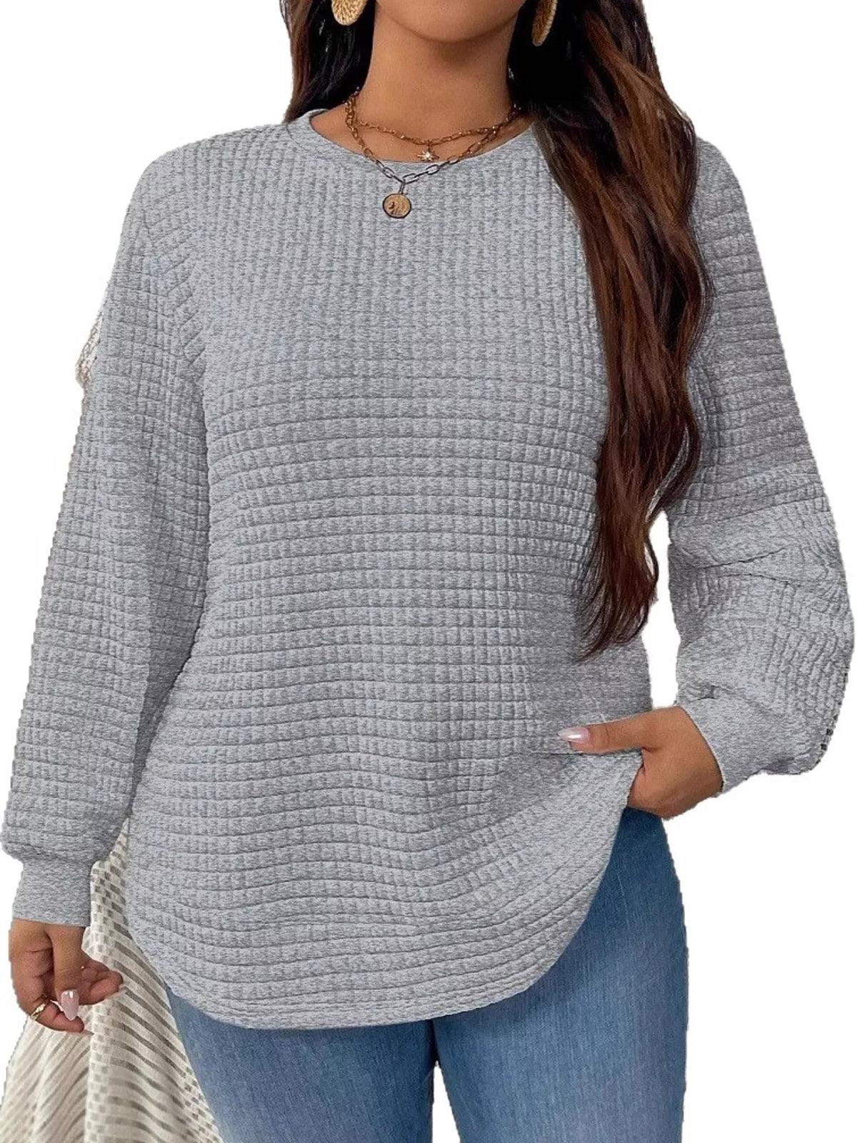 Gray waffle knit sweatshirt with curved hem