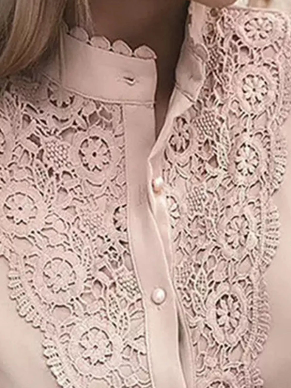 Lace neckline and button placket on dusty pink shirt
