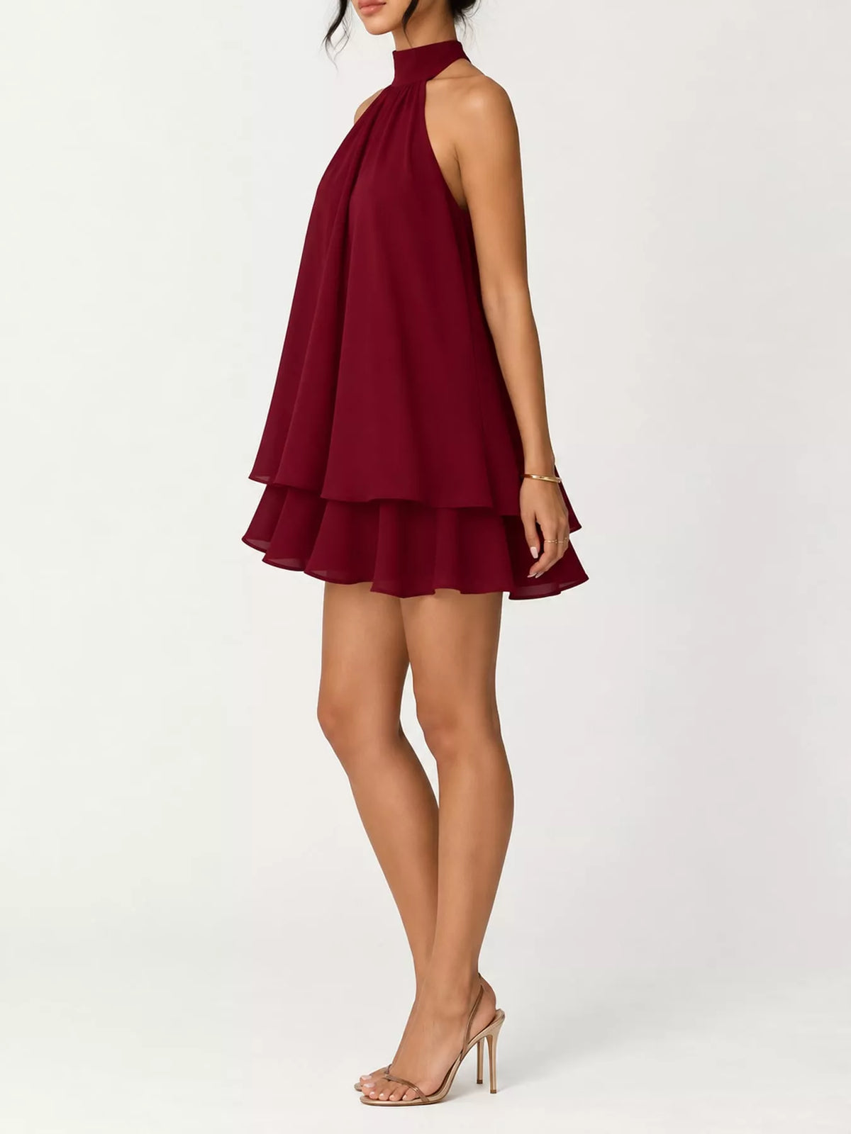 Burgundy halter neck layered mini dress, side view
