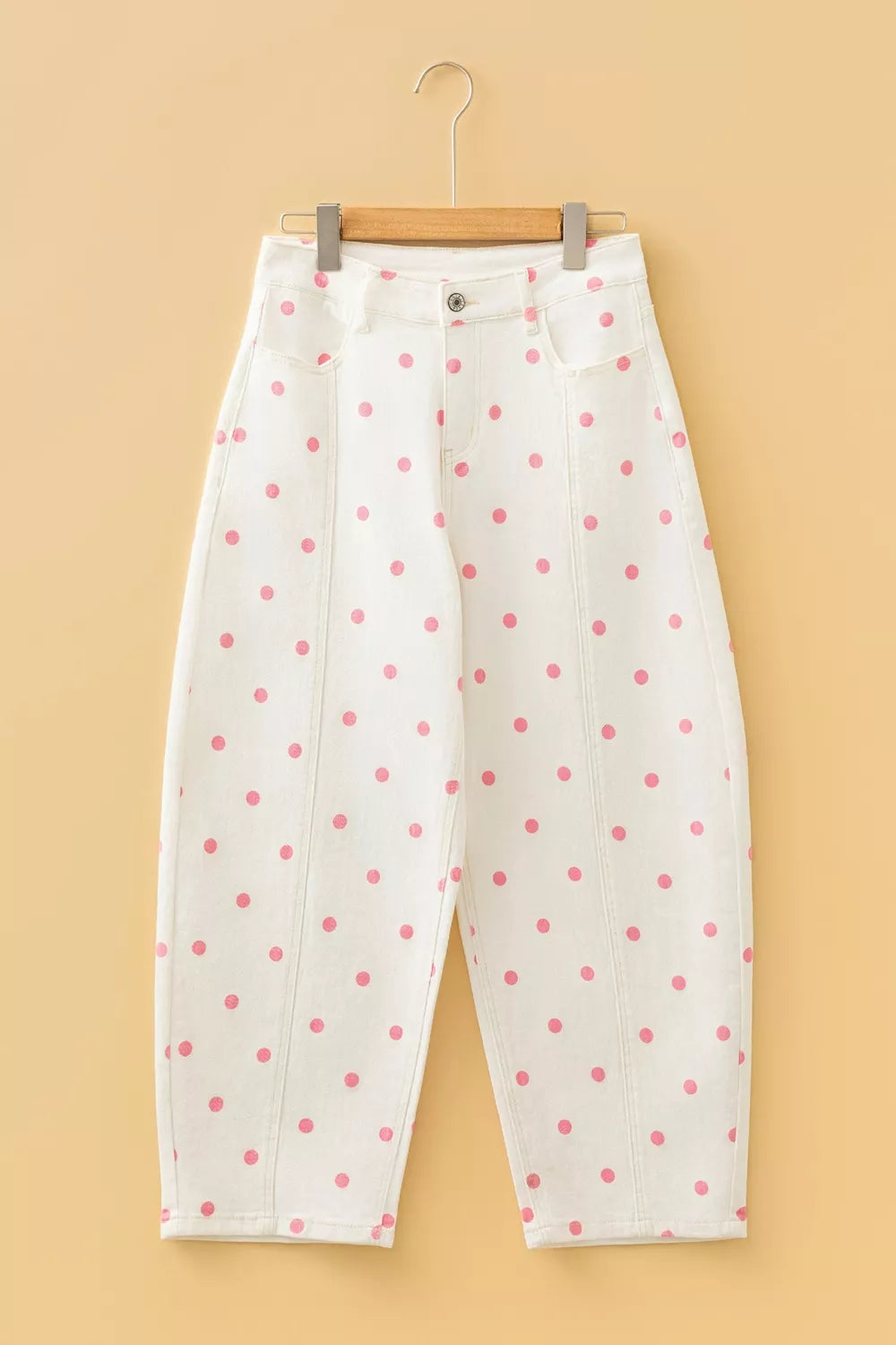 White with pink dots polka-dot cropped jeans, front on hanger