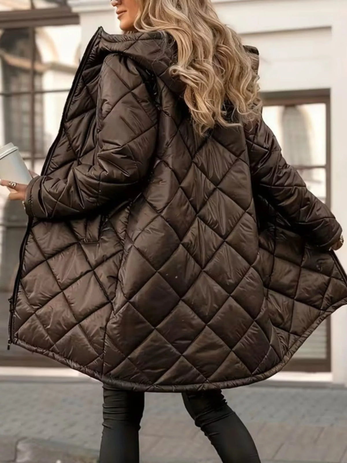 Brown hooded longline quilted puffer coat, back view showing diamond quilting.
