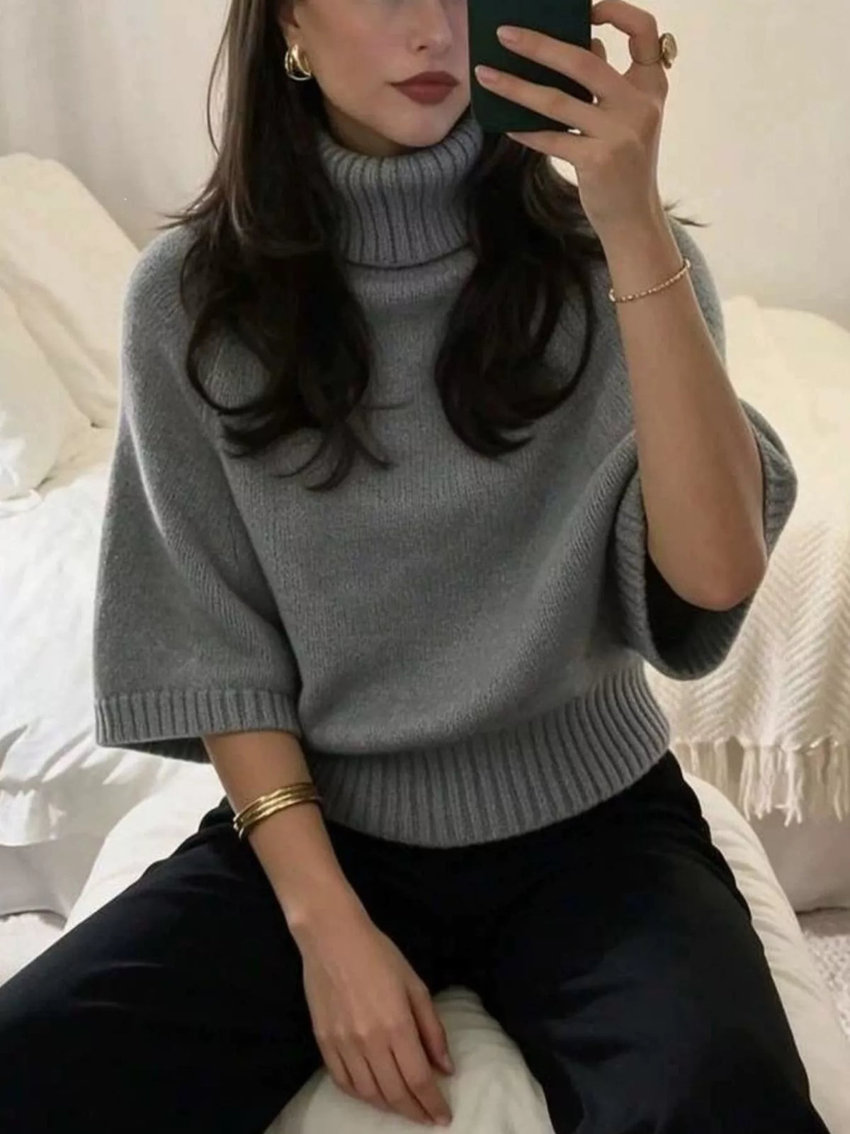 Turtleneck batwing top, gray seated view