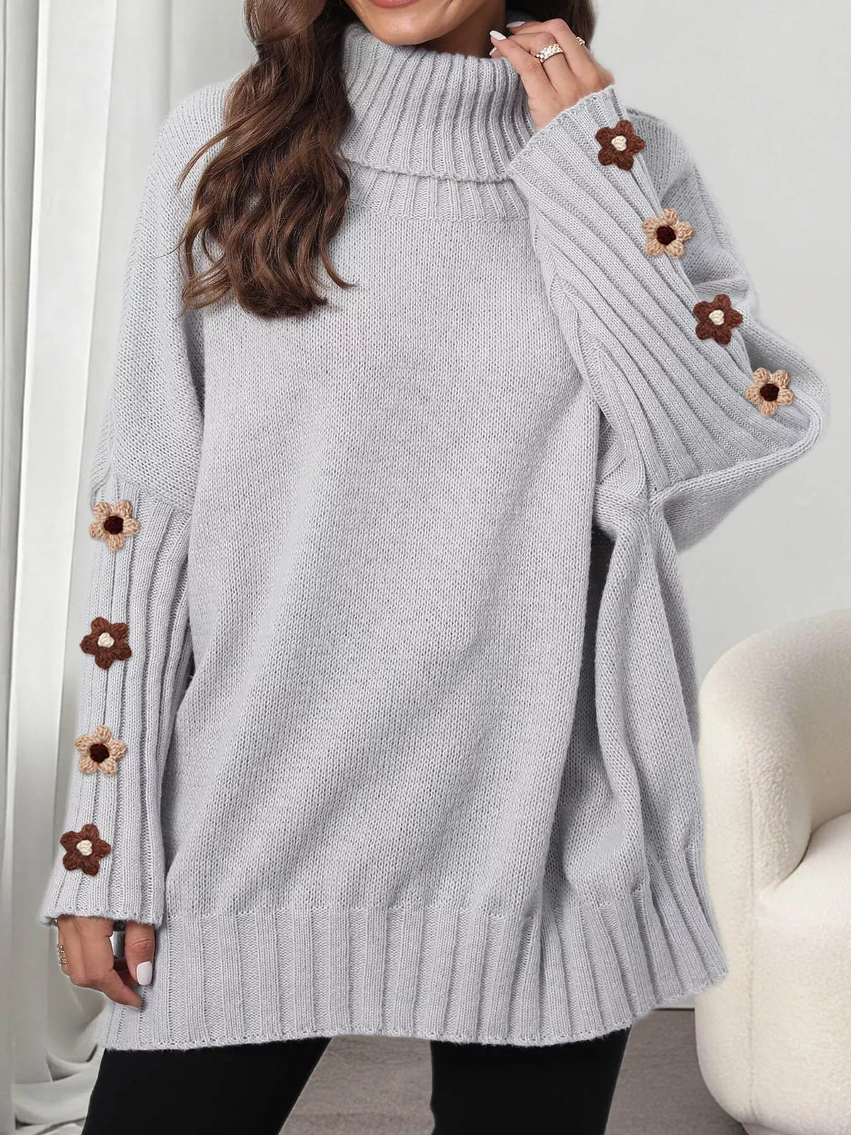 Gray oversized floral sleeve turtleneck sweater, neckline and sleeve detail