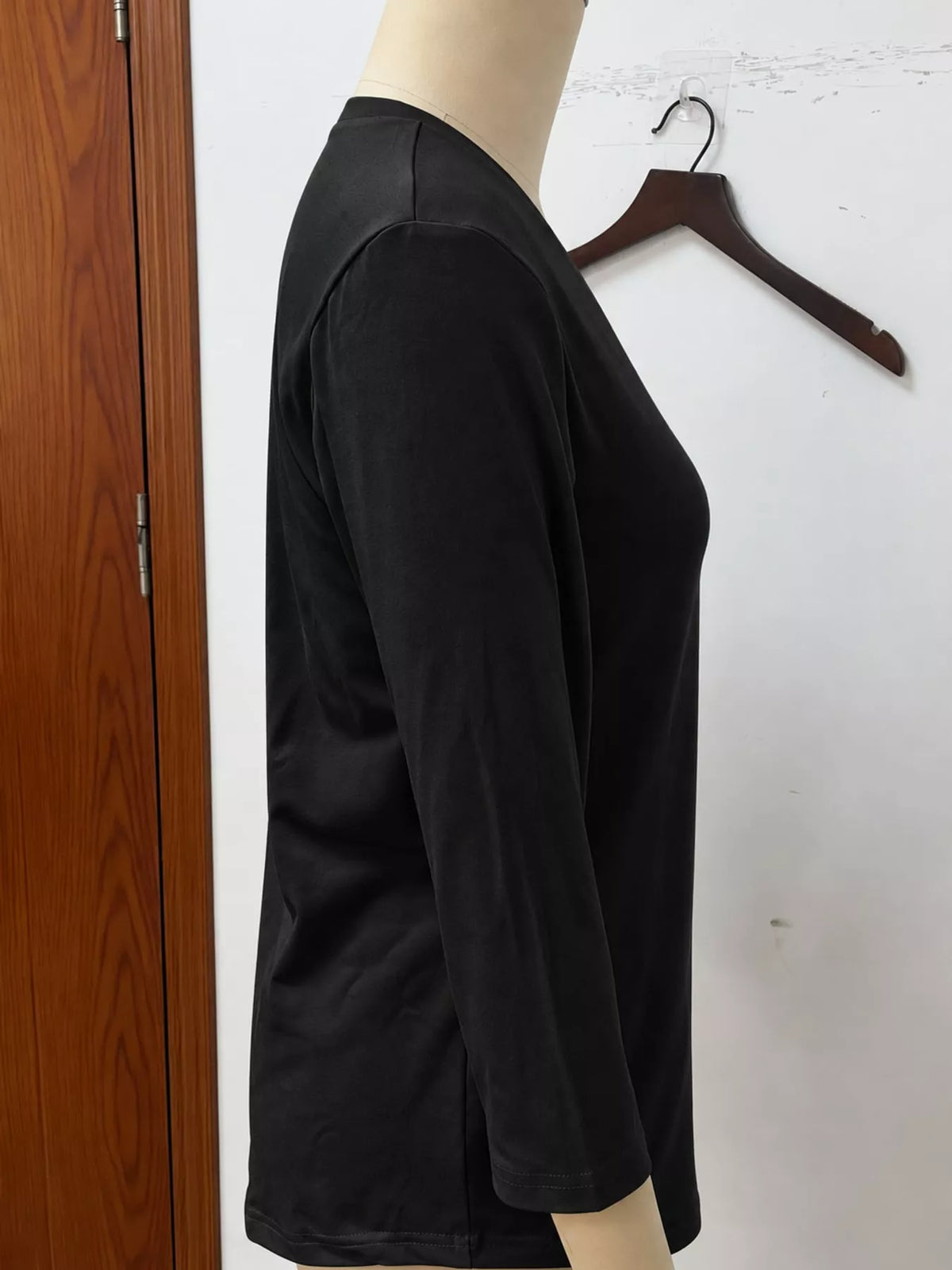 Black v-neck half sleeve t-shirt, detail view