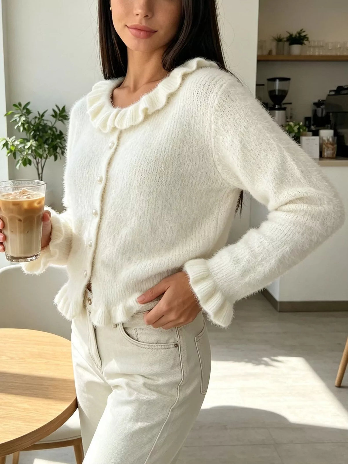 Ivory fuzzy ruffle-trim button-front cardigan, angled front view.