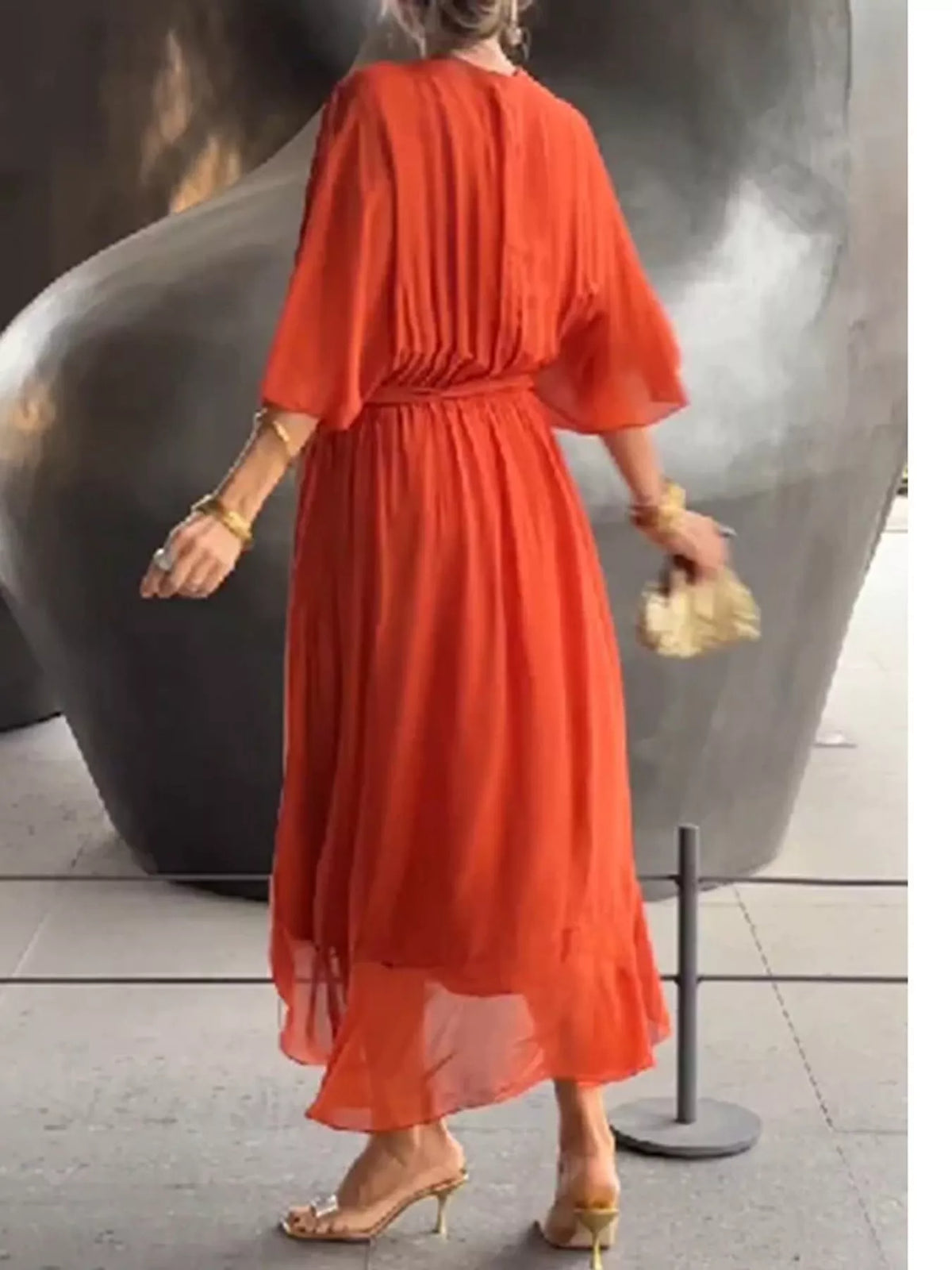 Orange-red batwing sleeve wrap dress with waist tie, back view