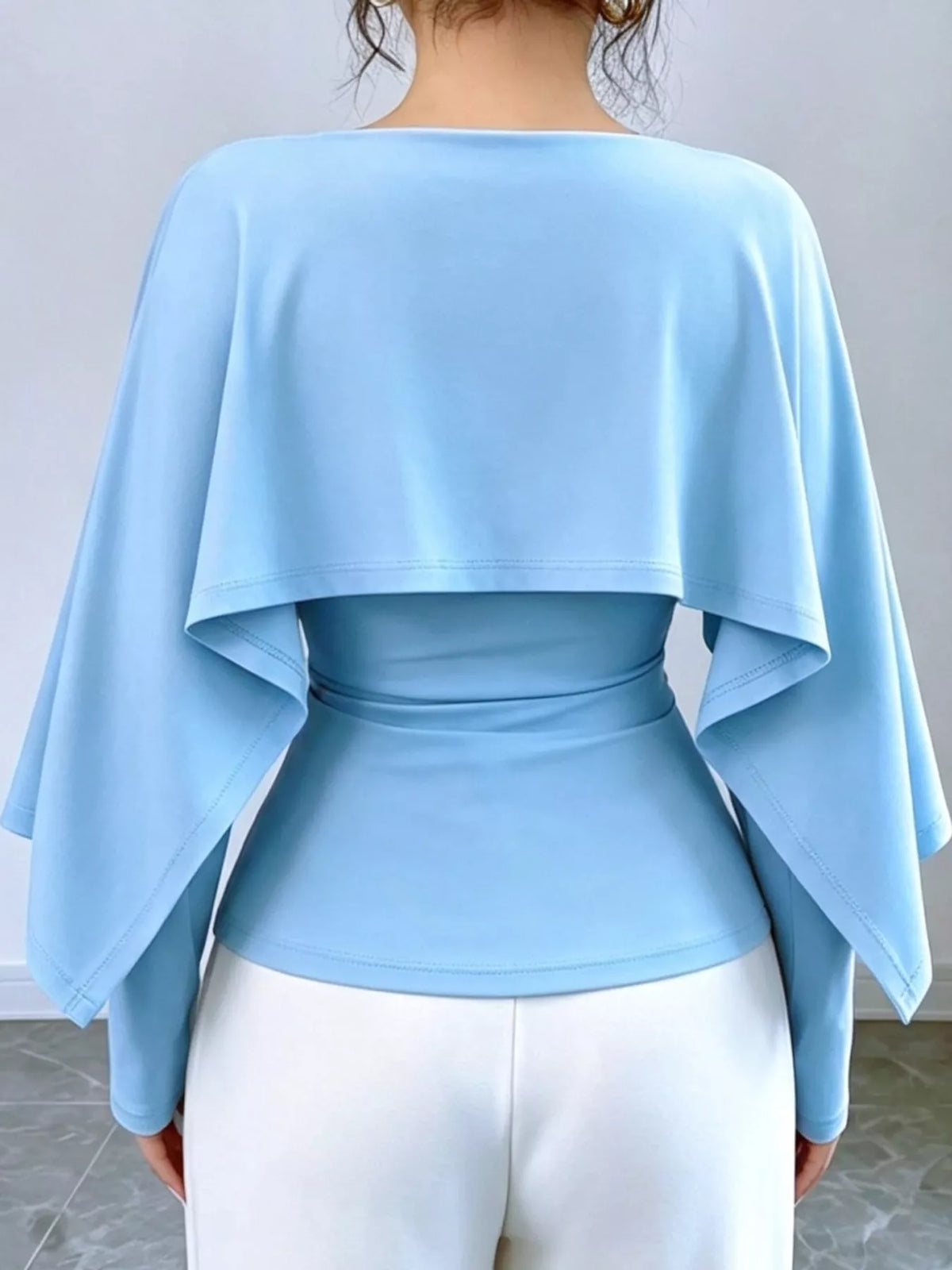Layered Cape-Style Blouse with Slim-Fit Bodice — back view