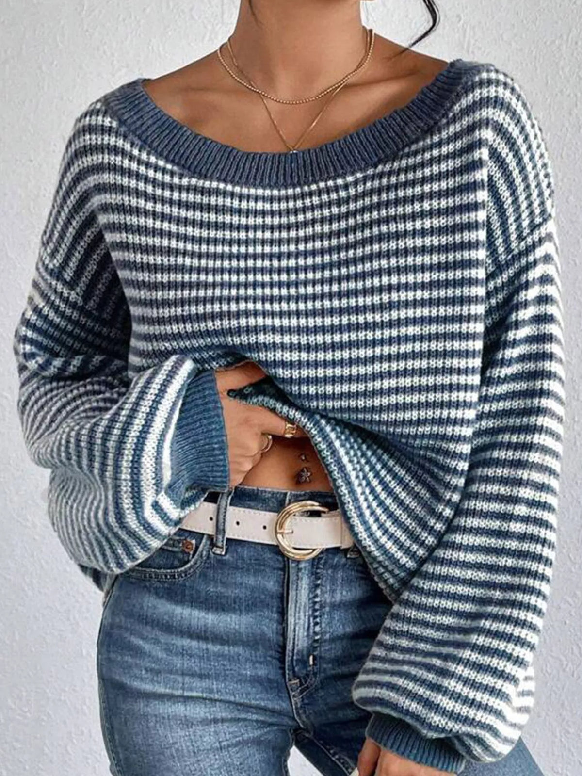 Blue and white striped knit boat neck sweater