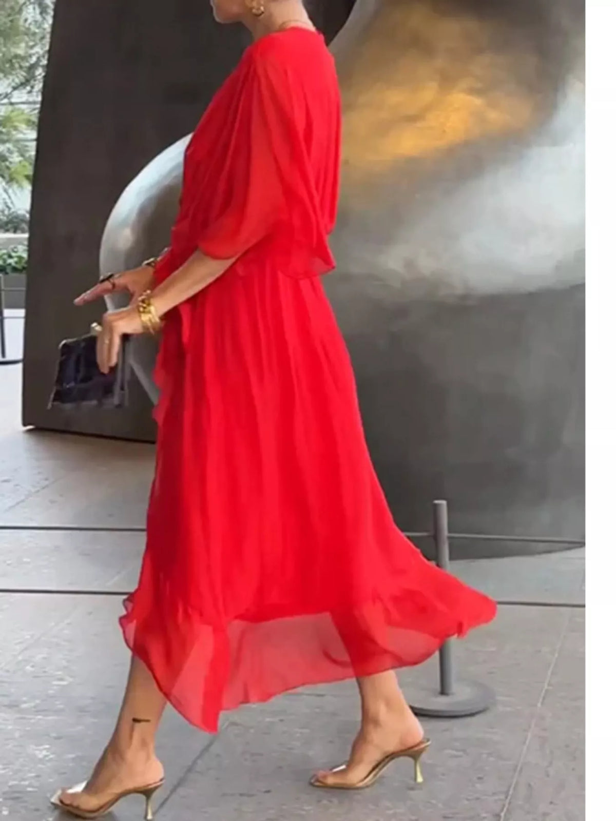 Red batwing sleeve wrap dress with waist tie, side view