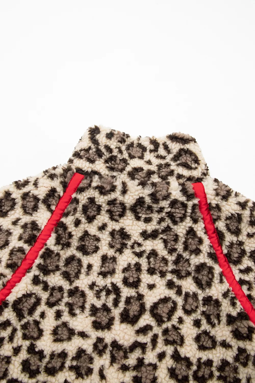 Leopard leopard half-zip sweatshirt with red trim, back shoulder trim detail.