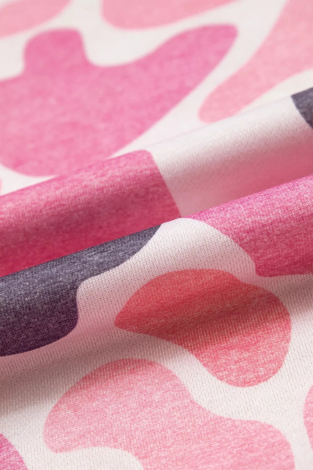 Pink camouflage Howdy sweatshirt, fabric print close-up