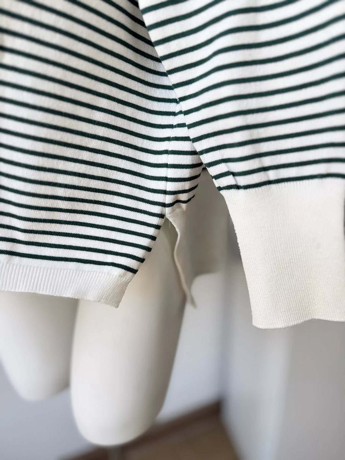 Striped round-neck knit top in white and green, side slit detail