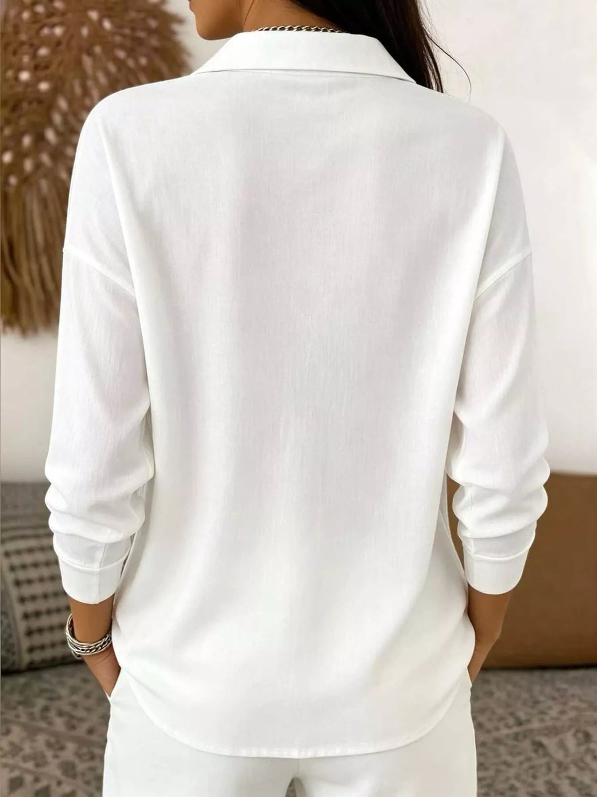 White waffle knit snap-front blouse, back view