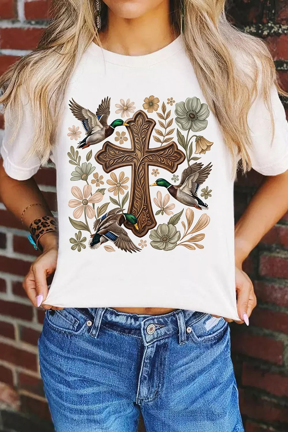 White mallard cross floral graphic T-shirt, front styled with jeans