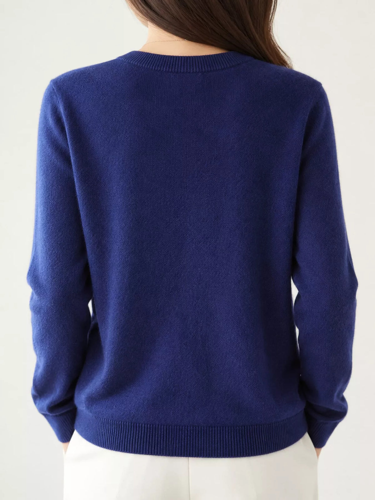 Navy crew neck button-front cardigan, back view