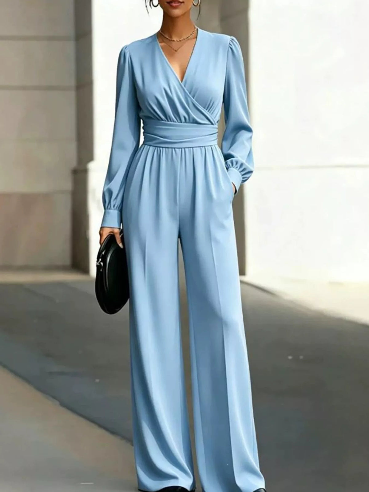 Surplice Long Sleeve Wide-Leg Jumpsuit in light blue, front view