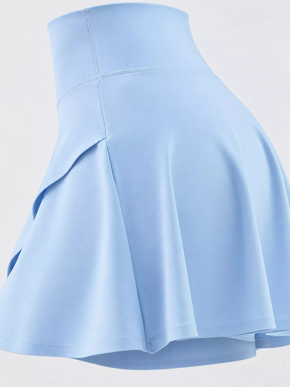 Blue flared athletic skort, side view