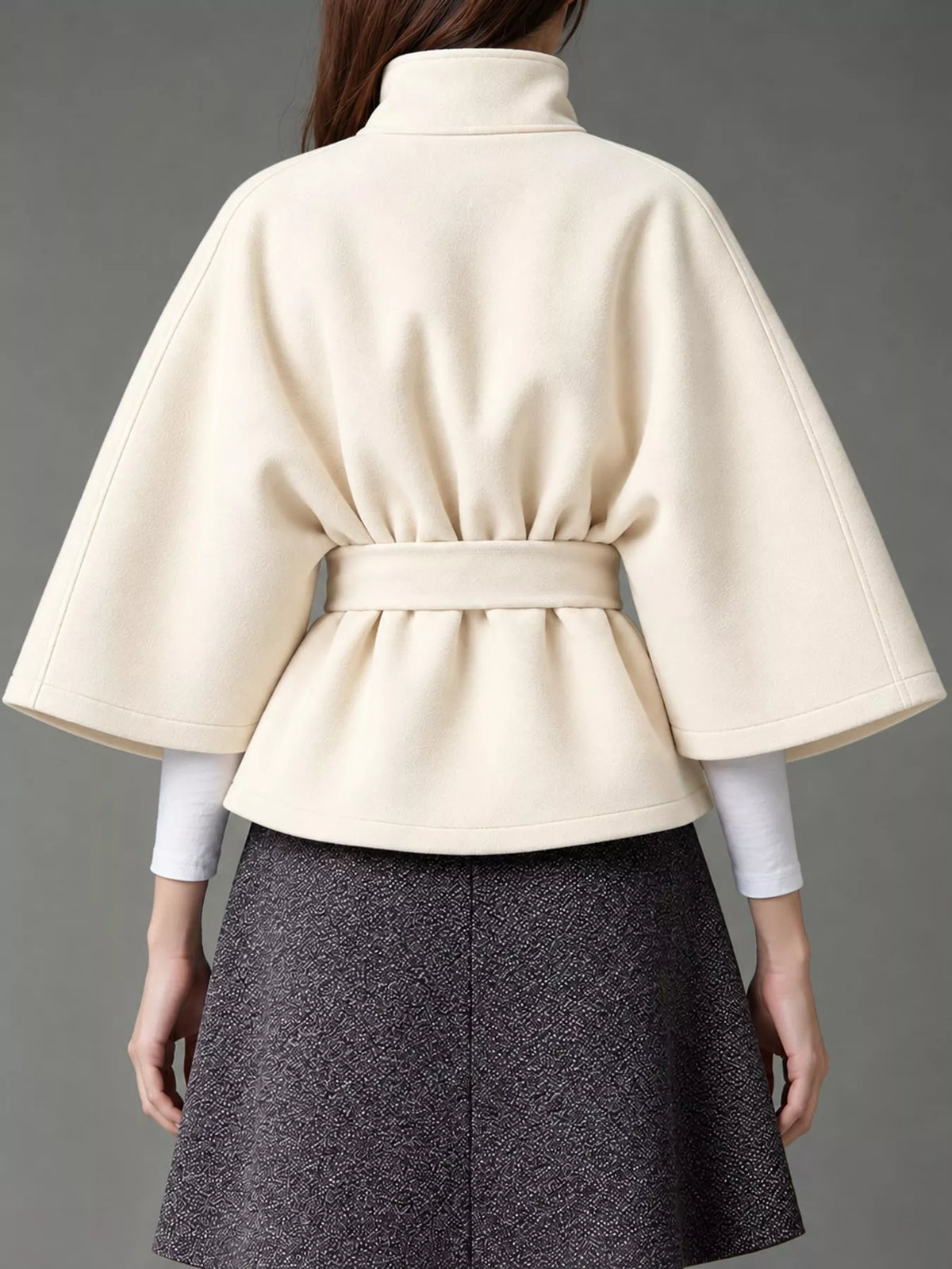 White belted button-front cape — back view