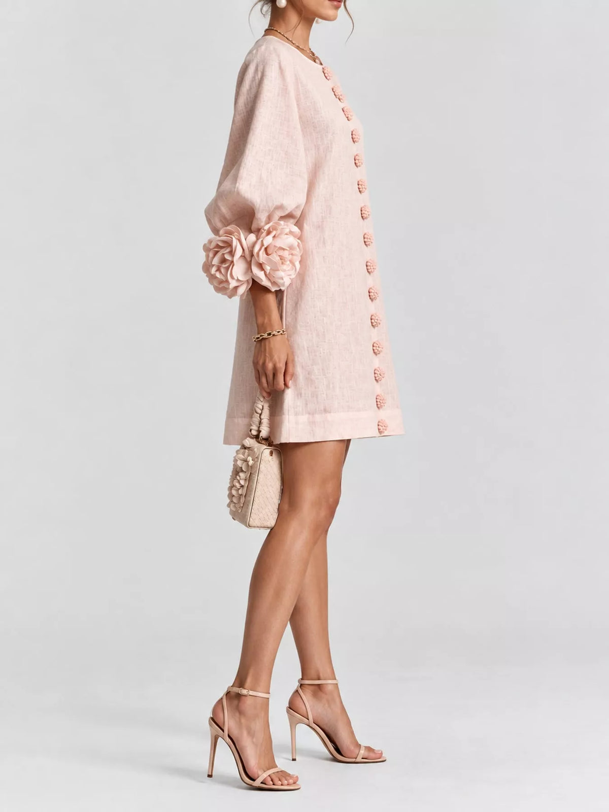 Blush button-detail dress with floral applique cuffs