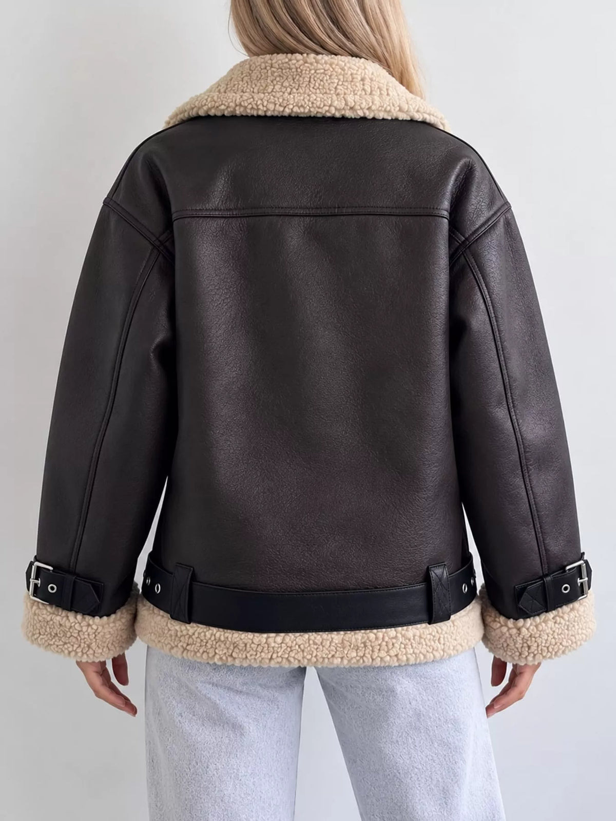 Black with cream trim faux leather zip up jacket, back view