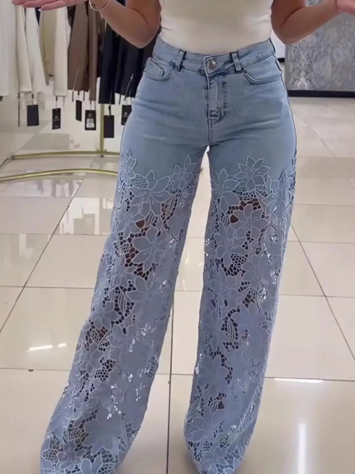 Light blue lace cutout wide-leg jeans — front view