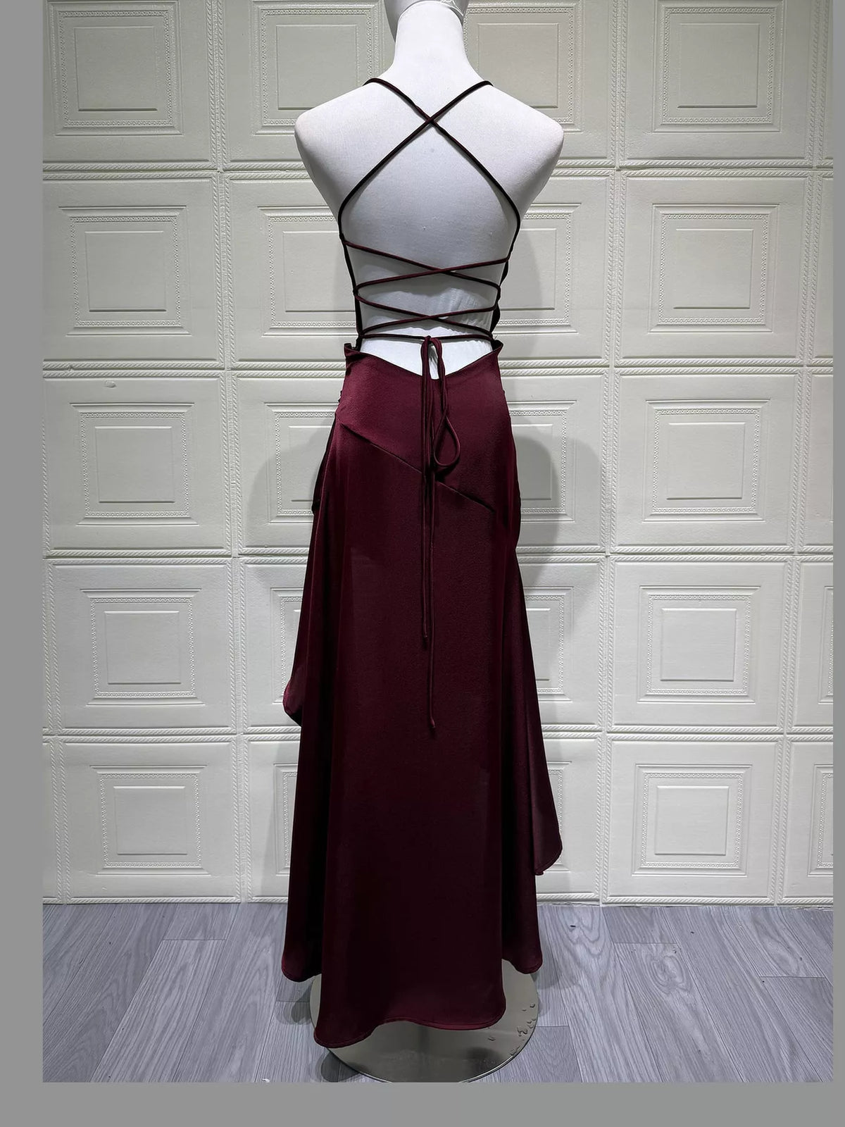 Burgundy high-low ruffle-hem evening dress, lace-up back view