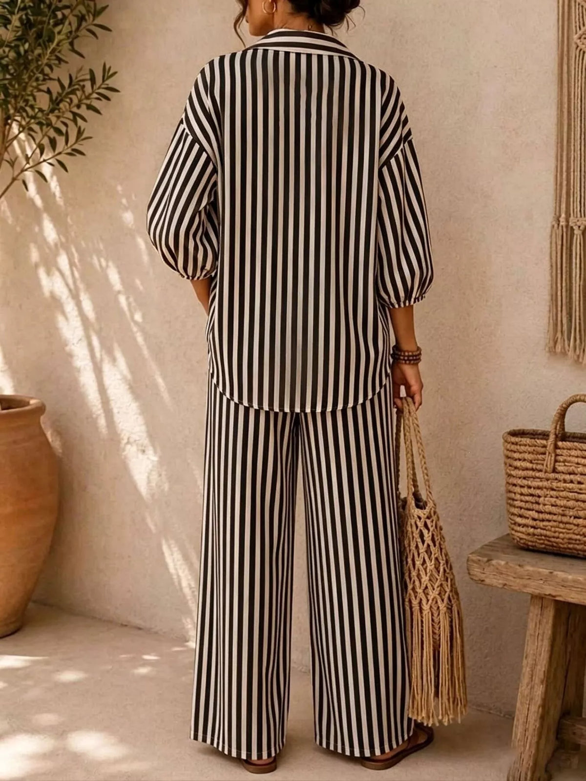 Black striped shirt and wide-leg pants set, back view